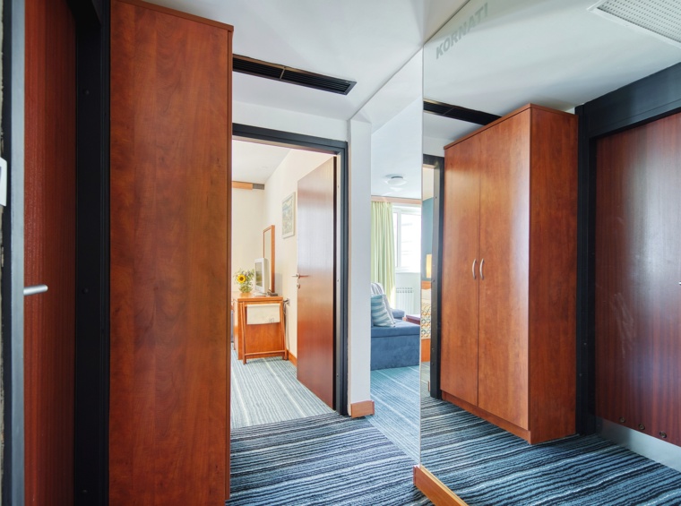 Practical hallway with built-in wardrobes and easy access to all rooms