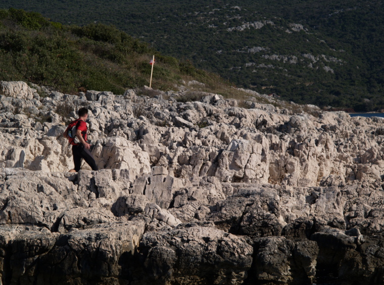 hiking along a rocky coastline by the sea