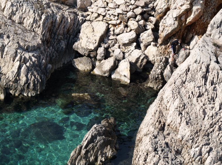 rocky cove with crystal clear sea