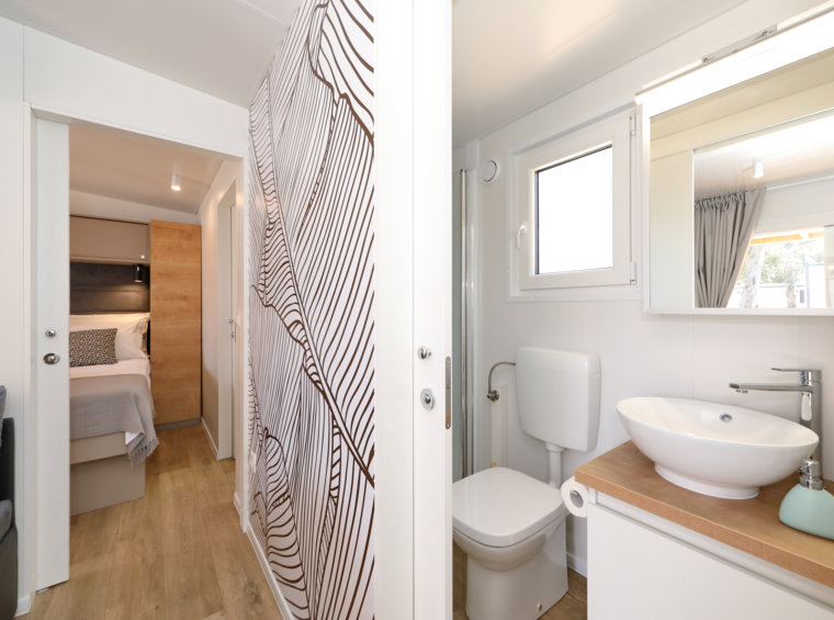 modern mobile home bathroom with shower and sink