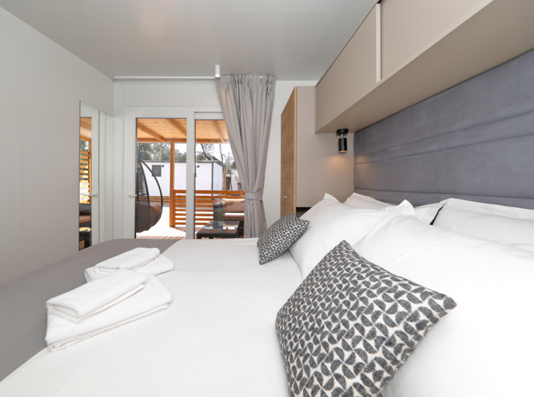 mobile home bedroom with double bed and modern design