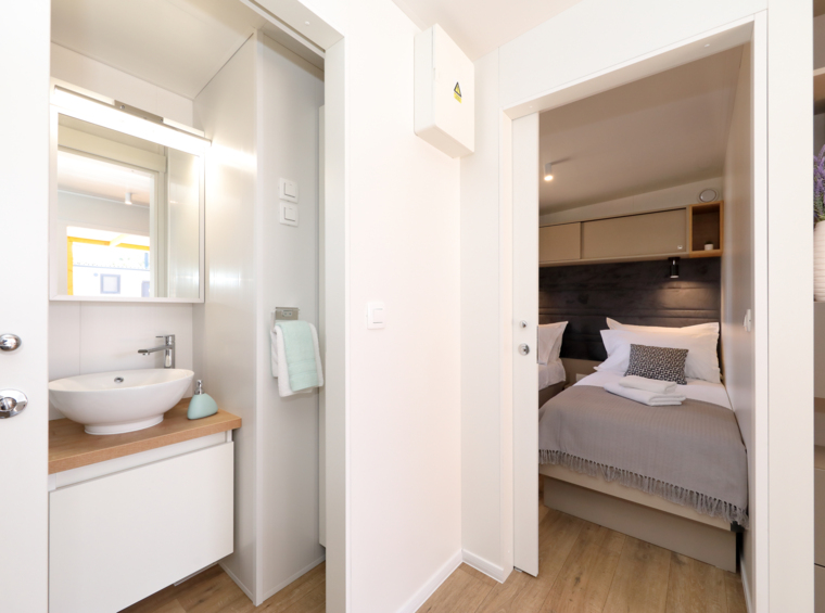 bathroom and bedroom in a modern mobile home