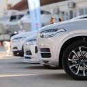 Parked cars outdoors with focus on the front part of the vehicle